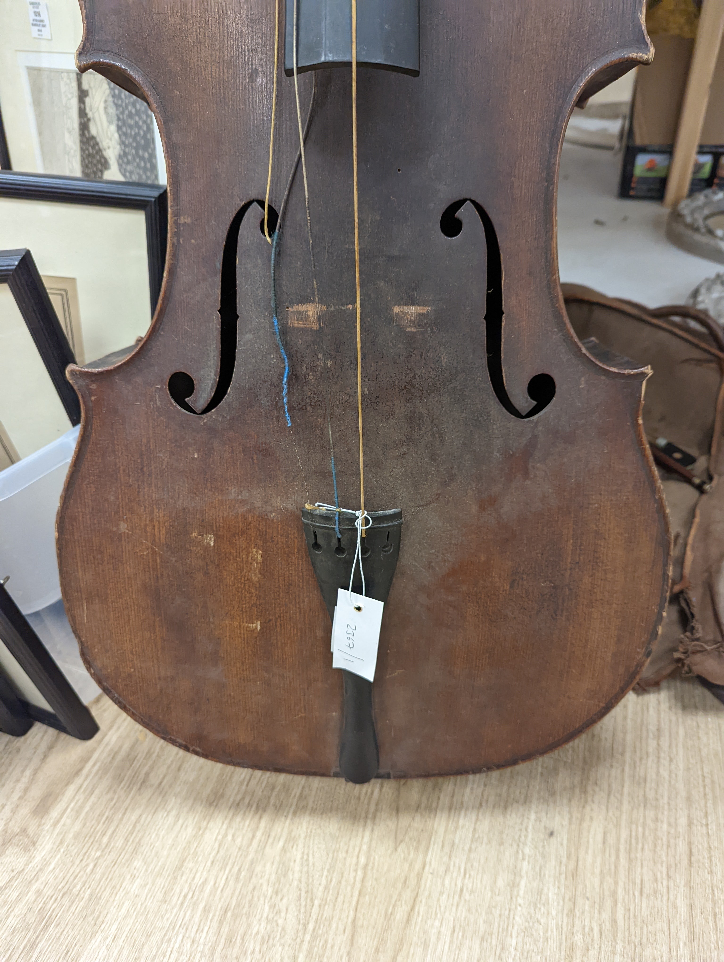 A late 19th century French cello, lob 75.5cm, canvas case with bow